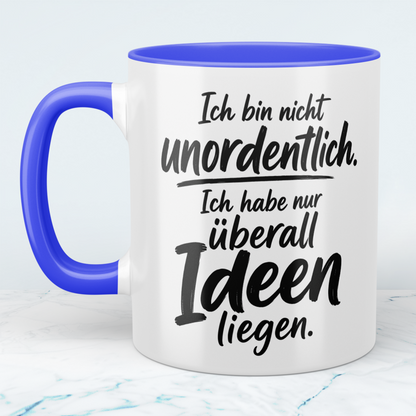Tasse „Ich bin nicht unordentlich. Ich habe nur überall Ideen liegen“ – lustige Spruch-Tasse für Kreative