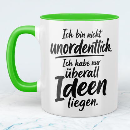 Tasse „Ich bin nicht unordentlich. Ich habe nur überall Ideen liegen“ – lustige Spruch-Tasse für Kreative