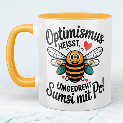 Lustige Tasse mit Spruch: Optimismus heißt umgedreht Sumsi mit Po! - Perfektes Geschenk fürs Büro!