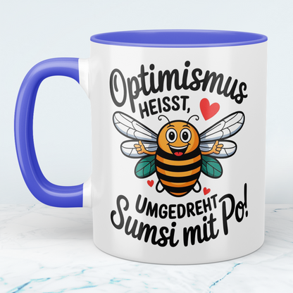 Lustige Tasse mit Spruch: Optimismus heißt umgedreht Sumsi mit Po! - Perfektes Geschenk fürs Büro!
