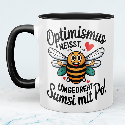 Lustige Tasse mit Spruch: Optimismus heißt umgedreht Sumsi mit Po! - Perfektes Geschenk fürs Büro!